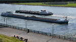 Die Motorschiffe PRIMAIR (ENI: 02205685) und VEENDAM (ENI: 02327026) begegnen sich auf dem Rhein bei Duisburg. (April 2021)