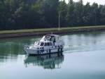  Albatros  spiegelt sich in den Morgenstunden im Rhein (Bereich Schleuse Rhinau);080830