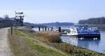 GMS La Camargue, an der Kiesverladeanlage am Rhein bei Wyhl, Heckansicht, März 2025