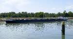 TMS GRENDEL ENI 04804130, rheinaufw�rts in Wartestellung vor der Staustufe Vogelgr�n/Elsa�, Mai 2026
