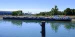 TMS BALDER ENI 06105686, rheinaufw�rts in Warteposition vor der Staustufe Vogelgr�n/Elsa�, Heckansicht, Juni 2026