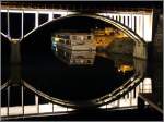 Die 2015 gebaute GIL EANES (ENI 01840470) liegt hinter der sich im Douro spiegelnden, nchtlich erleucheteten Brcke am Anleger in Barca d'Alva. Sie ist 80 m lang, 11,4 m breit und bietet 132 Passagieren Platz. Heimathafen ist Strasbourg (Frankreich). 05.05.2015