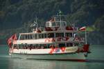 MS JUNGFRAU BLS AG, Schifffahrt Berner Oberland. Foto aufgenommen am 08.08.2014 im Hafenbecken von Brienz. Am 19. Oktober 1997 führte das MS Jungfrau, nach 43 Jahren und 636'927 Kilometern auf dem Thunersee, seine Abschiedsfahrt durch. Am 22. April 1999 läuft sie frisch restauriert zur zweiten Jungfernfahrt auf dem Brienzersee aus.