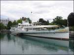 Der historische Raddampfer Blmlisalp an seiner Anlegestelle in Thun. Das Schiff wurde lt. Homepage der BLS-Schifffahrt 1906 gebaut. (Juli 2003)