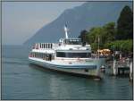 MS  Brunnen  legt im Hafen der Stadt Brunnen am Vierwaldstttersee an.