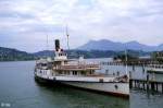 Raddampfer  Gallia  in Luzern (August 1985). Im Hintergrund die Rigi.