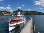 Das Dampfschiff  Schiller  verlsst am 18.08.2006 seinen Liegeplatz in Luzern, bers Steuer.