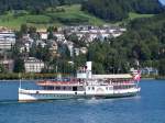 Das Dampfschiff  Schiller  verlässt am 18.08.2006 seinen Liegeplatz in Luzern, übers Steuer. 1906 erbaut bei Gebrüder Sulzer in Winterthur.