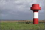 Das Leitfeuer Nebel auf der Insel Amrum ist zur Wattenmeerseite, zum Amrumrumtief - einer Fahrrinne zwischen Amrum und Fhr - hin ausgerichtet. Aufnahmedatum: 04.09.2006