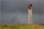 Das Leitfeuer Wriakhrn auf der Insel Amrum ist 17 m hoch. Durch seinen Standort auf einer Dne ist sein Feuer 26 m ber dem Meeresspiegel. Aufnahmedatum: 06.09.2006
