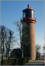 Das Orientierungsfeuer Staberhuk steht im Sdosten der Insel Fehmarn. Der Leuchtturm ist 22 m hoch und seit 1904 in Betrieb. Das Laternengehuse, die Optik, Galerie und Gelnder wurden vom alten englischen Leuchtturm auf Helgoland bernommen. Scan eines Dias vom 23.02.2003
