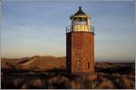 Der 1913 fertiggestellte Leuchtturm Rotes Kliff, nrdlich von Kampen gelegen, war bis 1975 als Quermarkenfeuer in Betrieb. Scan eines Dias vom 07.12.2004.