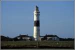 Der 40 m hohe Leuchtturm Kampen ist seit dem 1. Mrz 1856 in Betrieb. Er dient als See- und Orientierungsfeuer. Scan eines Dias vom 08.12.2004.