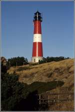 Der Leuchtturm Hrnum, im Sden von Sylt gelegen, wurde am 08.08.1907 in Betrieb genommen. Der 34 m hohe, gusseiserne Turm dient als See- und Orientierungsfeuer. Scan eines Dias vom 08.12.2004.