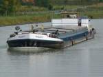 MS Nomadis  ENI 06003366 - L 80m - B 8.22m - Tg2.61m - T 1143. / Gemeldet in Brugge/B. Talfahrend in Birgte/DEK am 28.09.10.
