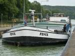 MS Fenix  ENI 06004263 - L 80m - B 8.20m - Tg 2.52m - T 1074m - PS 800-MWM - Bj 1957 in Breemen./ Gemeldet in Rotterdam/NL. Hier ist die Fenix am 21.06.2010 in der Schleuse Bvergern zu sehen.