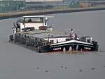 GMS Jupiter - 04007960 - Lnge: 80 m - Breite: 8,20 m - Tiefgandg: 2,45m - Tonnage: 1059 - Bj 1937 bei Bayrische Schiffswerft in Erlenbach - Gemeldet in Ost-Fehn/D. Hier bergfahrend in Birgte am 23.02.2011.