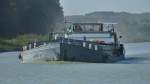 GMS Arila - 02301794 - Lnge: 67,11 m - Breite: 8,18 m - Tiefgang: 2,57 m - Tonnage: 927 - PS 560-Deutz - Bj 1927 bei Werf Bodewes in Martenshoek/NL - Gemeldet in Zwolle/NL. Hier zu Tal im Morgendunst im DEK bei Senden am 31.08.2009. 
