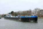 TMS  BURMESTER 100  (ENI 04813340 , 84,96 x 9,60 m) am 25.03.2025 beim Verlassen der Schleuse Altenrheine /  DORTMUND-EMS-KANAL  zu Berg.