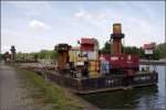 Der Ponton JBP I (04028190) der Fa. Johann Bunte, Papenburg, ist 52,5 m lang und 9,5 m breit. Am 26.07.2009 lag er am Mittellandkanal beim Abzweig des Stichkanals Osnabrck.