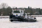 Eisbrecher  SEEWOLF  (ENI 05026670 , 21,89 x 5,10m) am 19.02.2026 beim Eisaufbruch auf dem  MITTELLANDKANAL  bei Hohenwarthe zu Berg.