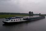 Die  Annette Maria  fährt aus dem Rhein-Herne Kanal in Richtung Rhein.