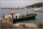 Das Bunkerboot SALVATUR an seinem Liegeplatz im Hafen von Mgarr auf Gozo. Im Hintergrund liegt die Fhre TA' PINU (IMO 9176307) der Gozo Channel Lines. 30.03.2009