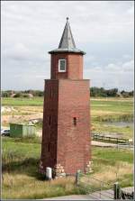 Der alte Leuchtturm in Dagebll war von 1929 bis 1988 in Betrieb. Hier endet auch die Lorenbahn von den Halligen Oland und Langeness. Aufnahmedatum: 27.08.2006