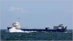 Die 2009 gebaute KUGELBAKE (IMO 9510747) kämpft sich durch das kabbelige Wasser der Nordsee. Sie ist 79 m lang und 19 m breit, hat eine GT/BRZ von 1.868 und eine DWT von 2.673 t. Heimathafen ist Cuxhaven. 13.09.2019
