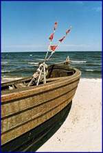 Detail eines alten Ostsee-Fischerkahn's am Strand von Klpinsee/Usedom.
Foto: Juni 2004, mit  PRAKTICA MTL-50 , Normalobjektiv mit UV Filter.