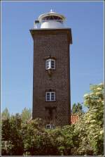 Seit 1937 ist das Orientierungsfeuer Pelzerhaken in Betrieb. Der Turm ist 19 m hoch. Scan eines Dias vom 29.05.2004.