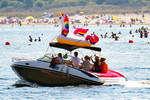 Sommer - Sonne - Spass!  Motorboot auf der Ostsee unweit Lübeck-Travemünde.