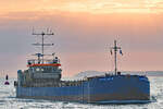 Baggerschiff HUGIN R (IMO: 8882430) bei Sonnenaufgang 15.05.2023 in der Ostsee vor Lübeck-Travemünde