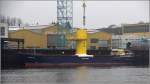 Die 1969 gebaute MERIDIAN (IMO 7002605) wird am 15.12.2015 in Bremen-Vegesack mit einem Turmsegment für eine Offshore-Windenergieanlage beladen. Sie ist 74 m lang, 11 m breit, hat eine GT von 1.251 und eine DWT von 1.404 t. Heimathafen ist Wilhelmshaven.