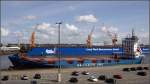 Die 1998 gebaute GERD SIBUM (IMO 9121895) liegt arbeitslos im Verbindungshafen in Bremerhaven. Sie ist 100 m lang, fast 18 m breit, hat eine GT von 3999 und eine Kapazitt von 511 TEU. Heimathafen ist St. John's (Antigua and Barbuda). Frherer Name: MAERSK SALERNO. Im Hintergrund ist das Schwimmdock III der Lloyd Werft zu sehen.  13.08.2009
