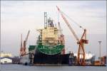 Die 2001 gebaute JANUS (IMO 9226516) liegt am 13.03.2011 im Dock III der Lloyd Werft in Bremerhaven. Sie ist 200 m lang, 30 m breit, hat eine GT von 25535 und kann 2452 TEU transportieren. Heimathafen ist Monrovia (Liberia).