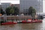 Die Feuerlschboote FEUERWEHR IV und OBERSPRITZENMEISTER REPSOLD am 10.10.2005 an der Kehrwiederspitze im Hamburger Hafen.
