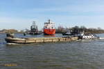 HANS (ENI 05603680) mit Spülschute AR-430 (Arnold Ritscher) am 22.2.2021 Hamburg, Elbe, im Köhlfleet  /
Ex Namen: SCH 2701, ARKONA, HANS seit 02.2019 /
Schubschiff / DDR Typ 27 / Lüa 23,74 m, B 8,18 m, Tg 1,09 m / 2 Deutz-Diesel, ges. 574 kW (780 PS) / gebaut: 1971 bei VEB Yachtwerft Berlin / Flagge: Deutschland, Heimathafen: Hamburg /
