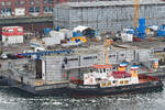 Schlepper FALCKENSTEIN (IMO 8917704) am 10.02.2023 in Kiel beim Büro- und Werkstattponton HÖRN 15 