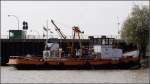 Die Stadtwerke Leer betreiben als Anstalt ffentlichen Rechts auch den Hafen Leer. Zur Flotte gehrt dieses Schiff STADTWERKE (5400050). Aufgenommen am 10.04.2009.