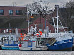 Die Fischereiboote TRA 64  HANSEAT  und TRA 006  SANTOS  waren Anfang April 2024 in Travemünde zu sehen.