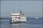 Das 1959 als Inselversorger gebaute Fahrgastschiff  Baltica  der Reederei BSTW luft am 09.07.13 in Warnemnde ein.