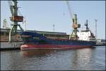 Der etwas heruntergekommene Frachter  Solveig K  welcher unter der Flagge von St. John's fhrt am 09.07.13 im Seehafen Rostock.