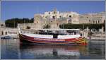 Die MARYANNE gehrt zur Flotte der Captain Morgan Cruises auf Malta und wird fr Hafenrundfahrten durch die Hfen Vallettas genutzt. Hier ist sie am 27.03.2009 im Dockyard Creek des Grand Harbours.