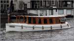 Das Salonboot TOURIST ist am 09.06.2015 in Amsterdam unterwegs. Sie ist 12 m lang und 2 m breit.