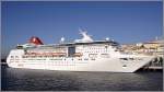 Die 1990 gebaute EMPRESS (IMO 8716899) der Pullmantur Cruises liegt am 11.10.2011 in Lissabon. Sie ist 211 m lang, 31 m breit, hat eine GT von 48.563 und kann 2.005 Passagiere und 686 Besatzungsmitglieder befrdern. Die 4 Maschinen leisten zusammen 16.400 kw und ermglichen eine Geschwindigkeit von 19,4 kn. Heimathafen ist Valletta (Malta).