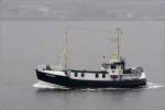 Die BLAUORT am 14.09.2015 im strömenden Regen in der Kieler Förder. Mit dem 24 m langen udn 6 m breiten Schiff werden Angelfahrten durchgeführt.