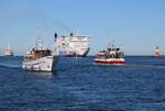 MS Merkur II,Warnowstar,Skane und Copenhagen am 26.02.20222 im Seekanal vor Warnemünde.