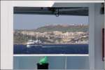 Unsere Fhre steuert den Hafen von Mgarr auf Gozo an. Entgegen kommt uns bei heftigem Wind die 2002 gebaute MALITA (IMO 9176321). 25.03.2009