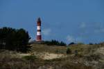Leuchtturm Amrum. Baujahre 1873-75. Int.-Nr.: B 1686. Mit 63m Feuerhhe der hchste Turm an der deutschen Nordseekste. Das Leuchtmittel ist eine mit 230 Volt betriebene 250 Watt Halogenlampe. Foto: Mai 2011